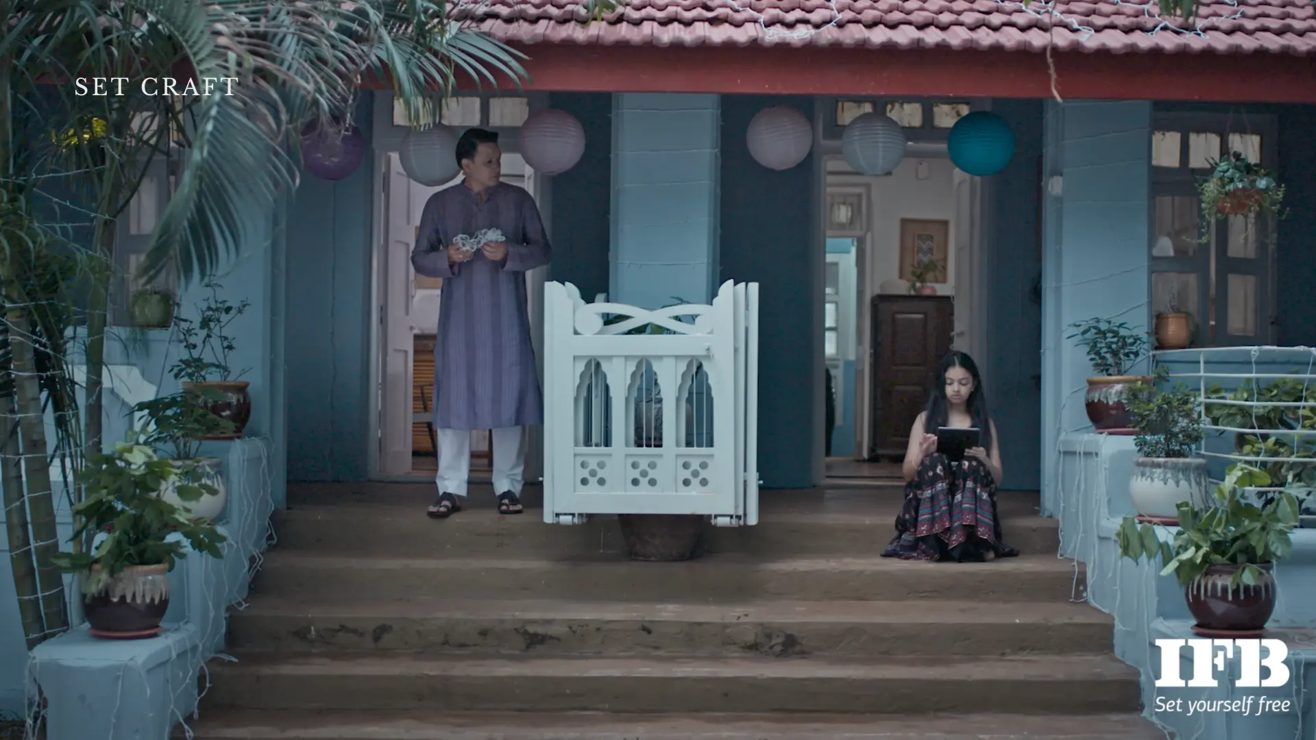indian home verandah wide shot family sitting realistic house setup