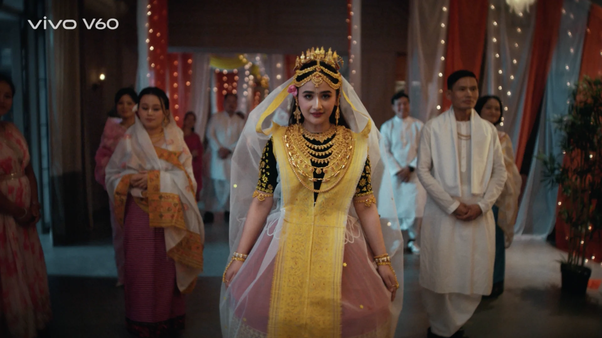 manipuri bride traditional attire potloi wedding entrance draped decor lights