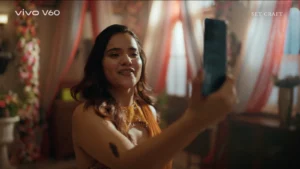 woman taking selfie wedding indoor drapes warm lighting set design