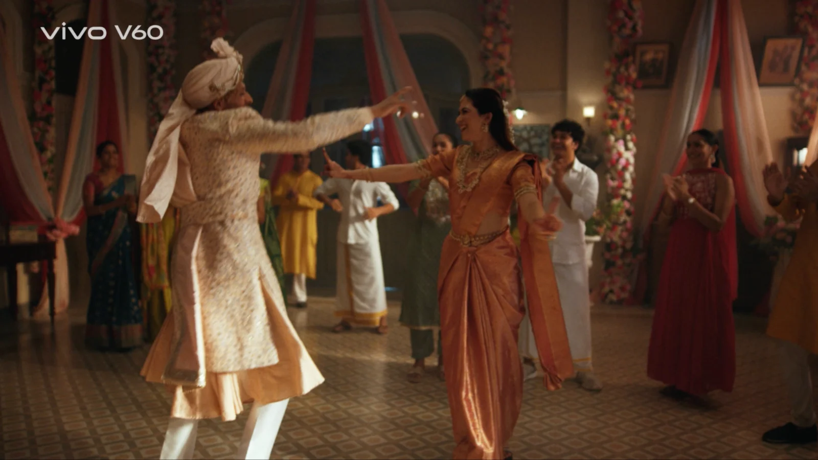 wedding dance scene group wide shot interior decorated hall