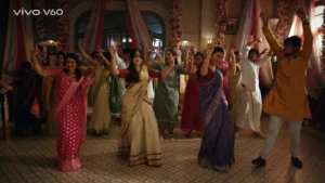 indian wedding group dance colorful outfits warm lighting hall