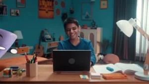 Colorful kids study room set with teal walls, study desk and playful decor designed for an educational commercial.