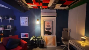 Soundproof office studio interior with acoustic ceiling panels and creator workspace designed by Set Craft