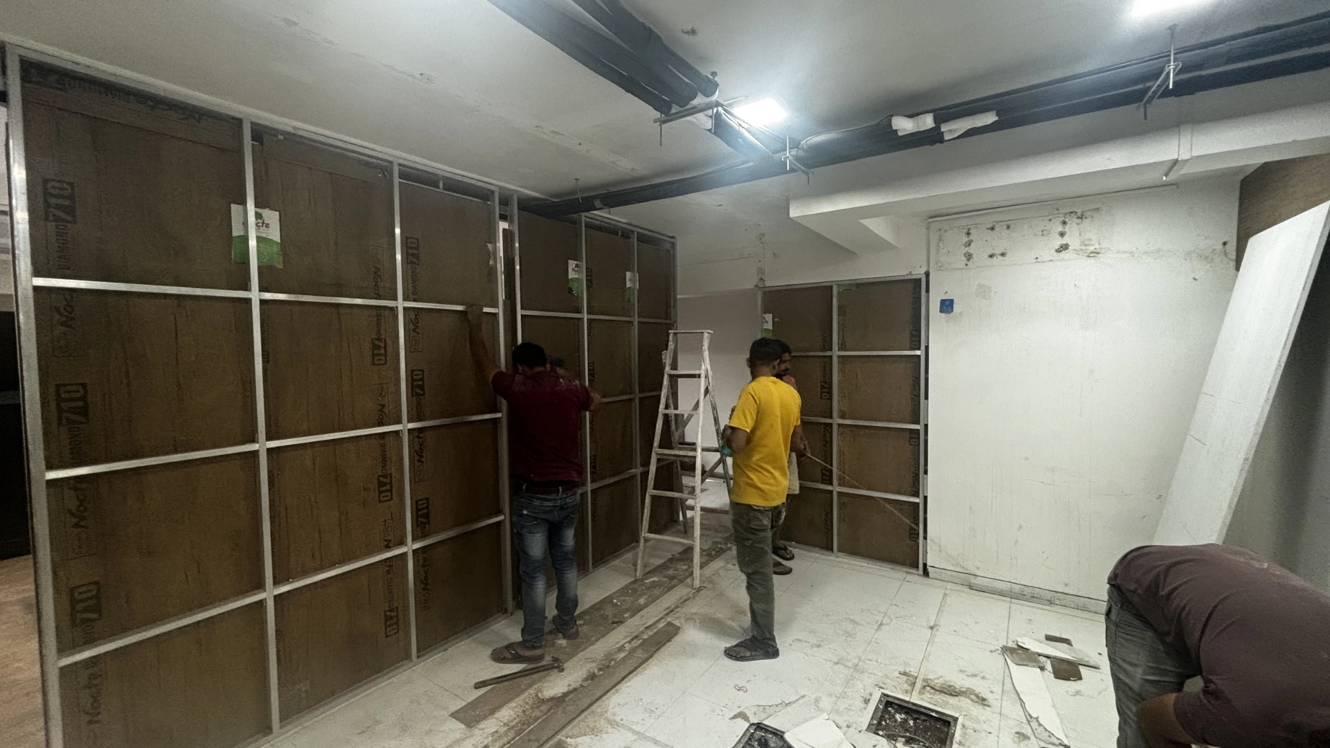 Wall framework installation during Set Craft studio construction