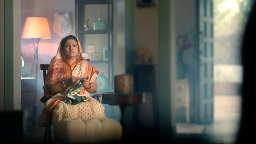 Traditional Indian home courtyard set with vintage architecture, warm daylight, and cinematic family interiors.