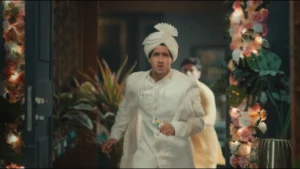 Grand wedding entrance setup with floral decor and groom entry styling for a cinematic wedding sequence.