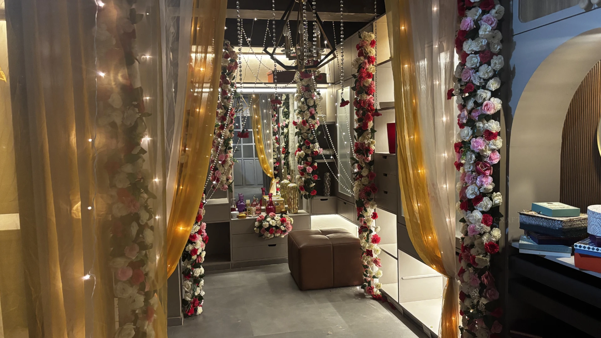 Behind the scenes bridal room styling with floral decor and wedding production design elements