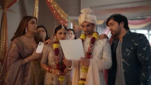 Bride, groom and wedding guests inside a North Indian wedding set designed for a Vivo campaign