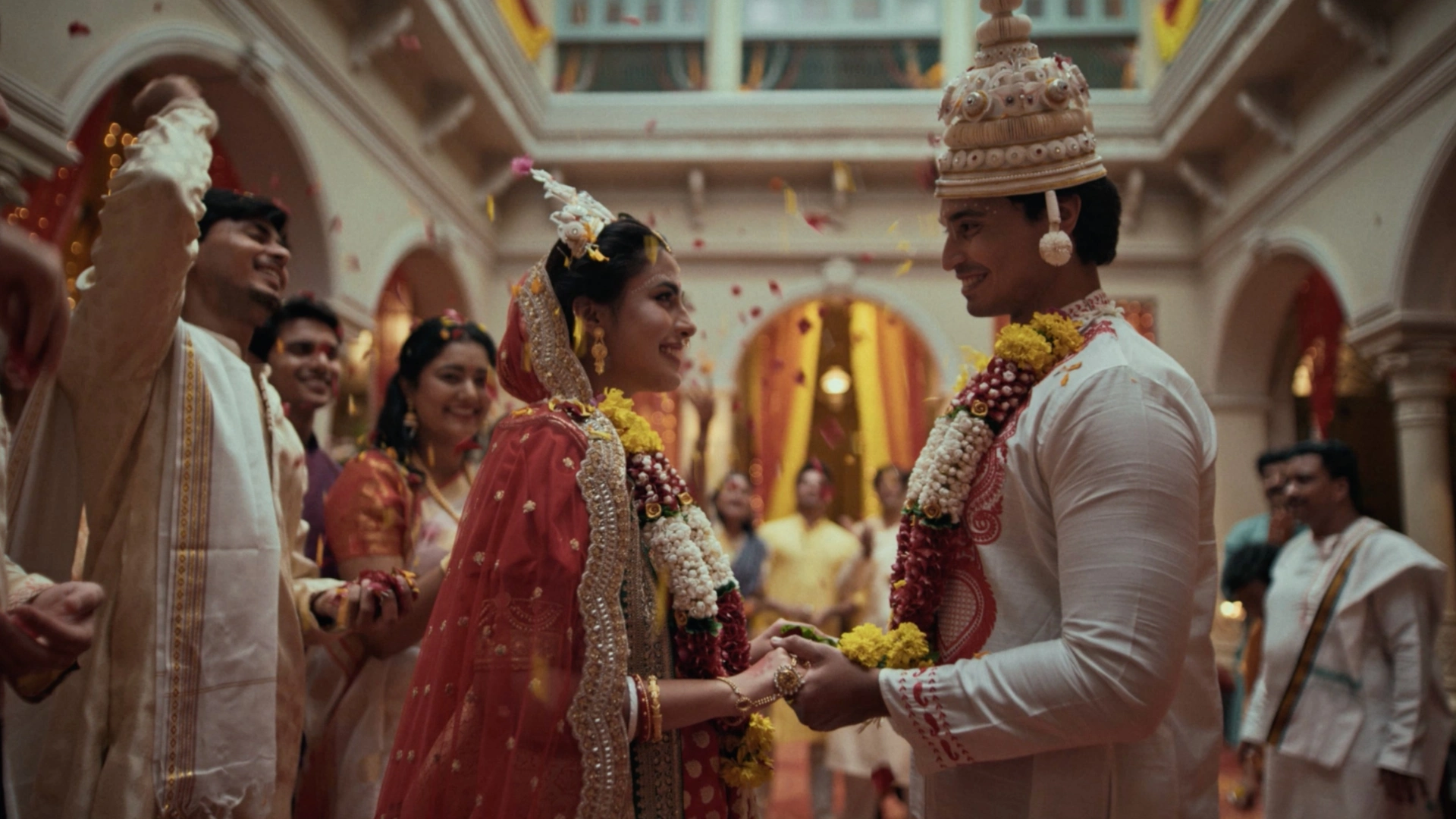 Bengali wedding ceremony scene designed by Set Craft for Vivo Wedding Films featuring traditional attire, floral garlands and cultural wedding decor.